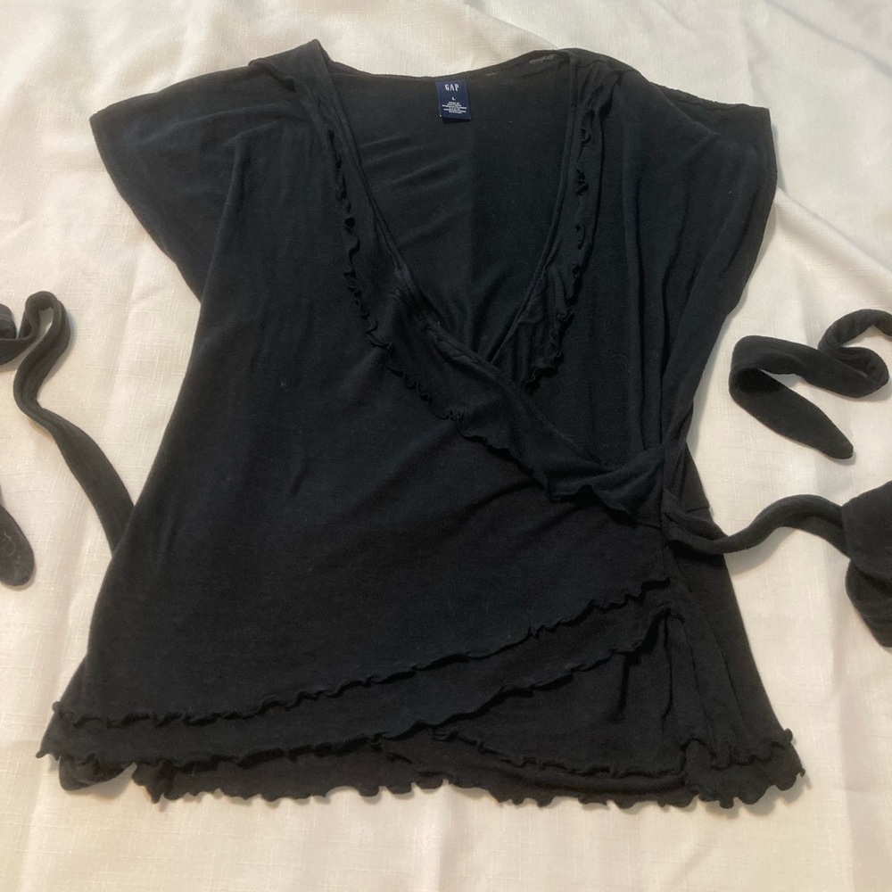 Gap Women’s black knit wrap top in size L.